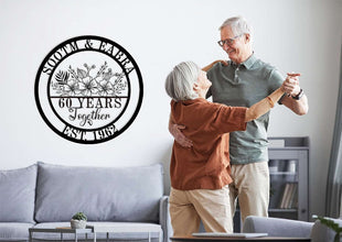 Custom metal sign, anniversary gift, with floral design and “50 YEARS Together” text.