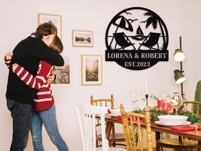 Personalized beach metal sign with chairs, palm trees, and sailboat, custom names and date, laser-cut steel wall art for weddings, anniversaries, or beach house decor.