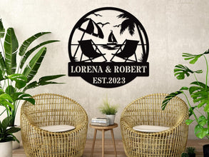 Personalized beach metal sign with chairs, palm trees, and sailboat, custom names and date, laser-cut steel wall art for weddings, anniversaries, or beach house decor.