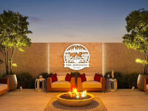 Custom firepit metal sign with family name and established year, laser cut from steel and powder coated, personalized outdoor wall décor with chairs, fire, and nature design.