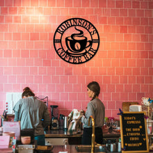 Custom coffee bar metal sign featuring a steaming cup and personalized name text, laser-cut from premium steel with powder-coated black finish.