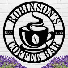 Custom coffee bar metal sign featuring a steaming cup and personalized name text, laser-cut from premium steel with powder-coated black finish.