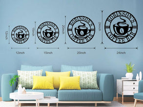 Custom coffee bar metal sign featuring a steaming cup and personalized name text, laser-cut from premium steel with powder-coated black finish.