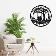 Custom metal sign with couple on swing under tree, personalized with names, dates, or anniversary messages, laser-cut steel with powder coat finish