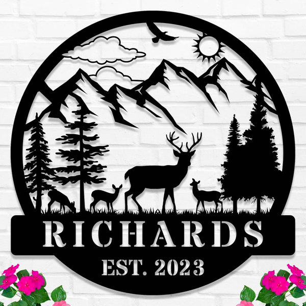Custom deer family metal sign featuring a mountain and forest scene with personalized name  and date text in laser-cut steel.
