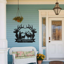 Custom metal sign featuring deer, antlers, pine trees, mountains, and personalized family name and established year.