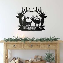 Custom metal sign featuring deer, antlers, pine trees, mountains, and personalized family name and established year.