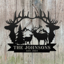 Custom metal sign featuring deer, antlers, pine trees, mountains, and personalized family name and established year.