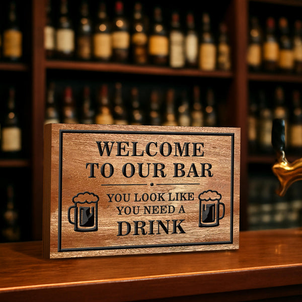 Custom engraved pine wood bar sign with personalized text and beer mug design, rustic home bar wall decor