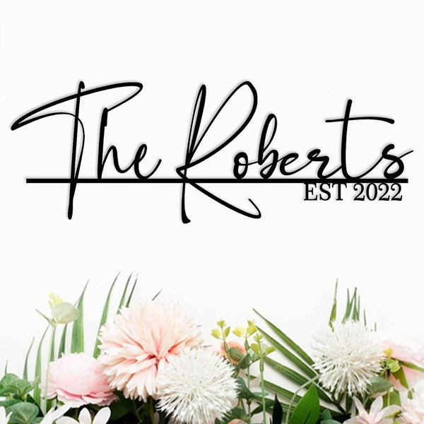 Custom metal sign featuring "The Roberts EST 2022" in black script font, laser cut from steel and powder-coated, personalized wall décor for family or wedding gift
