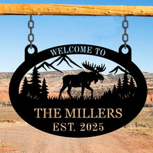 Custom moose metal sign with personalized text, laser-cut steel wall art featuring moose, mountains, and trees, powder coated finish for rustic cabin and lodge décor.