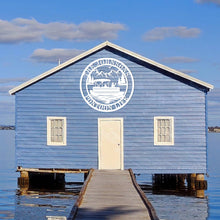 Custom laser-cut metal sign with pontoon boat and personalized family name, ideal for lake house or cabin wall decor