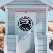 Custom laser-cut metal sign with pontoon boat and personalized family name, ideal for lake house or cabin wall decor