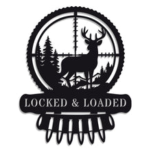 Custom metal deer hunter wall sign featuring buck in scope with bullet detail, powder-coated black steel, perfect for hunting cabin or man cave décor with customizable text.