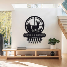 Custom metal deer hunter wall sign featuring buck in scope with bullet detail, powder-coated black steel, perfect for hunting cabin or man cave décor with customizable text.