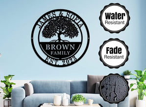 Custom metal family tree sign with names and date laser-cut into black powder-coated steel for personalized home décor.