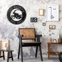 Black metal football helmet sign with personalized text