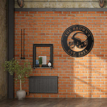 Black metal football helmet sign with personalized text