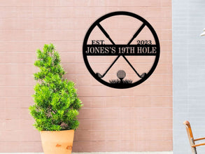 Custom golf 19th hole metal sign with crossed clubs and tee, personalized with name and year, laser-cut steel wall art for golf lovers and home bar decoration