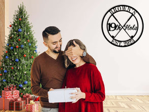 Round custom metal golf sign featuring crossed golf clubs and