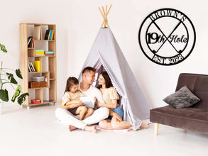 Round custom metal golf sign featuring crossed golf clubs and