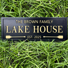 Custom engraved pine wood sign with personalized text, paddle design, and weatherproof finish – perfect for lake house or rustic cabin decor