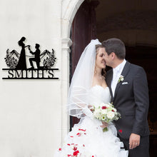 Custom romantic metal proposal sign with man on one knee and personalized last name