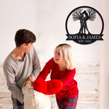 Custom Tree Couple Metal Sign featuring intertwined lovers as tree trunks, personalized with names and date, laser-cut from premium steel with powder-coated finish.
