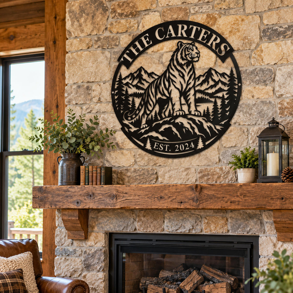 Custom tiger metal wall art with family name displayed above a stone fireplace in a rustic living room.