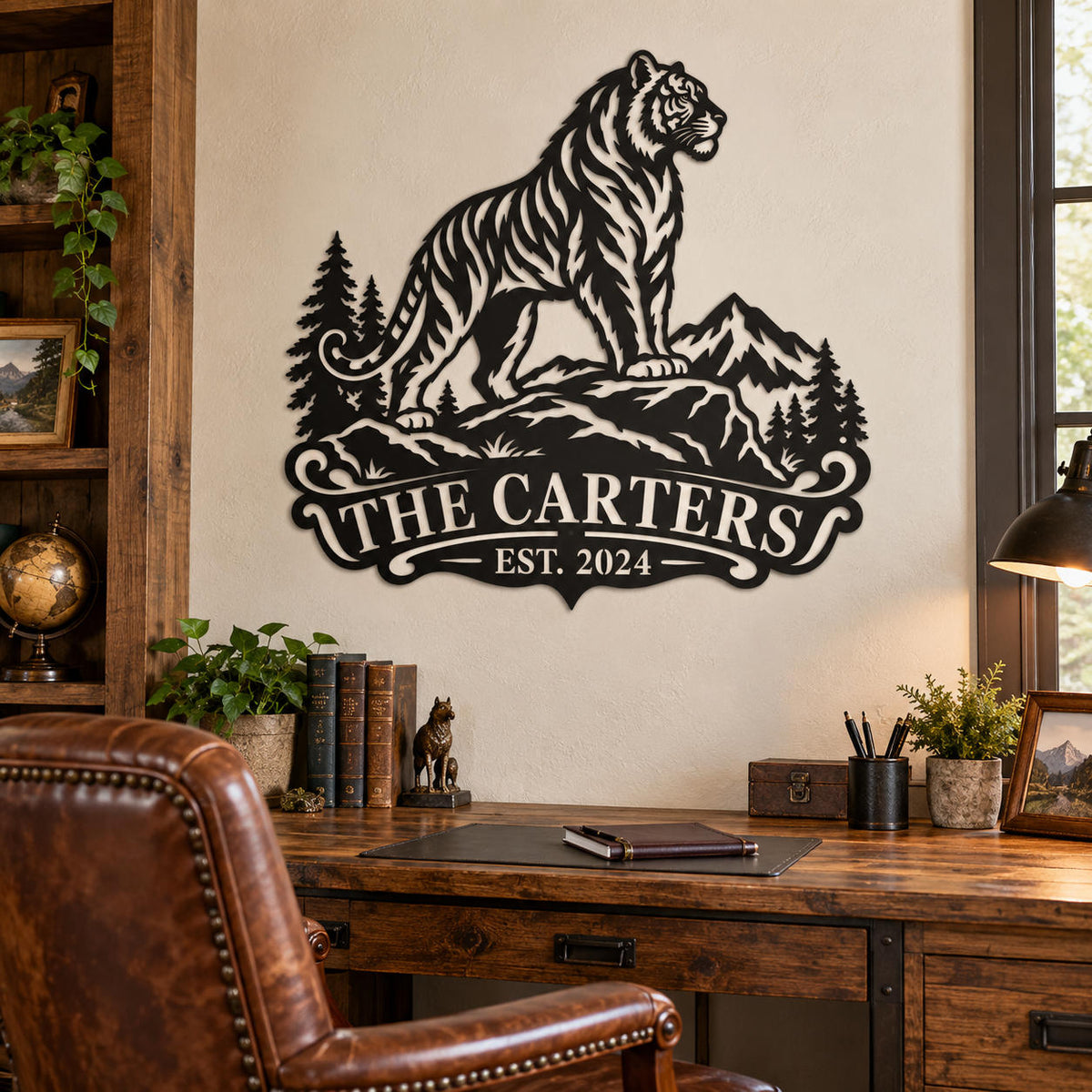 Black tiger metal wall art with custom family name displayed in a rustic home office.