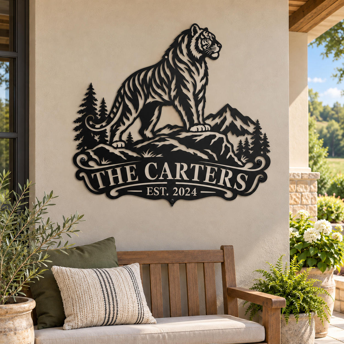 Custom tiger mountain metal sign mounted on a covered country house patio wall.
