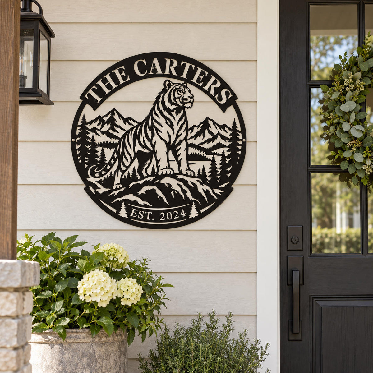 Custom tiger family name metal sign mounted beside the front door of a farmhouse-style home.