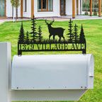 Customized stainless steel mailbox topper with a majestic deer and pine trees silhouette, black powder-coated finish with personalized house address text.