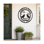 Personalized lovebirds metal family sign displayed on a farmhouse front porch.