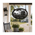 Personalized farm metal sign hanging on a farmhouse porch.