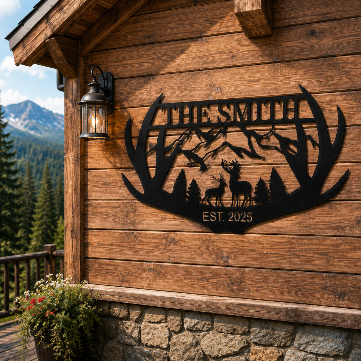 Custom antler family name metal sign with mountain and deer design displayed on a rustic cabin wall.