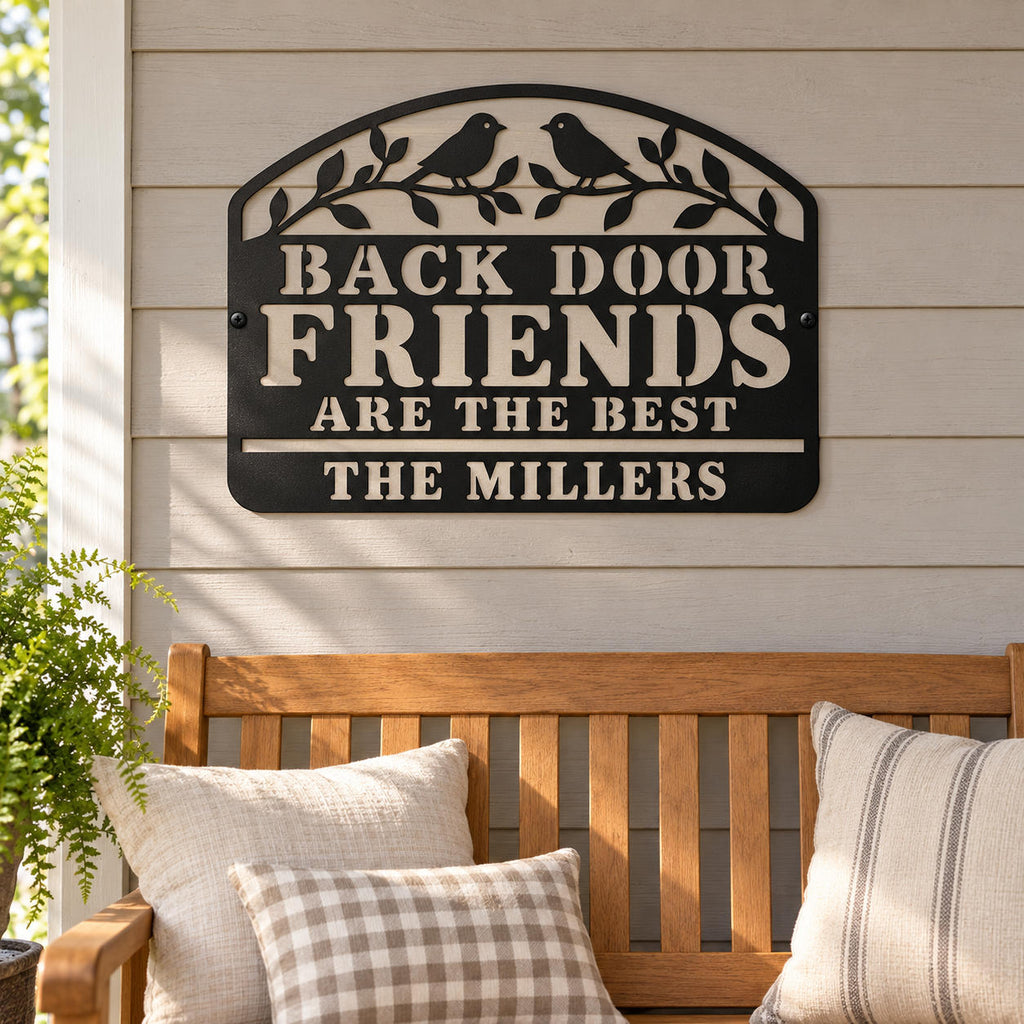 Back Door Friends Are the Best metal sign with The Millers family name above a wooden porch bench.