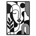 Black metal abstract woman wall art with laser cut design on white background