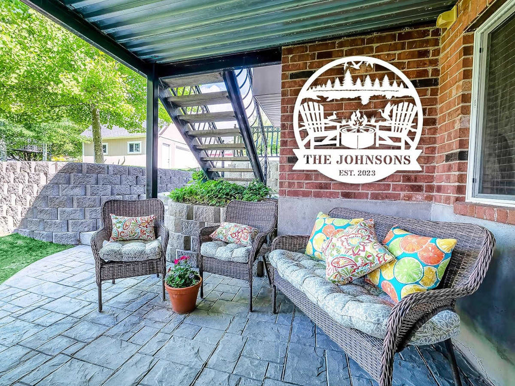 Custom firepit metal sign with family name and established year, laser cut from steel and powder coated, personalized outdoor wall décor with chairs, fire, and nature design.