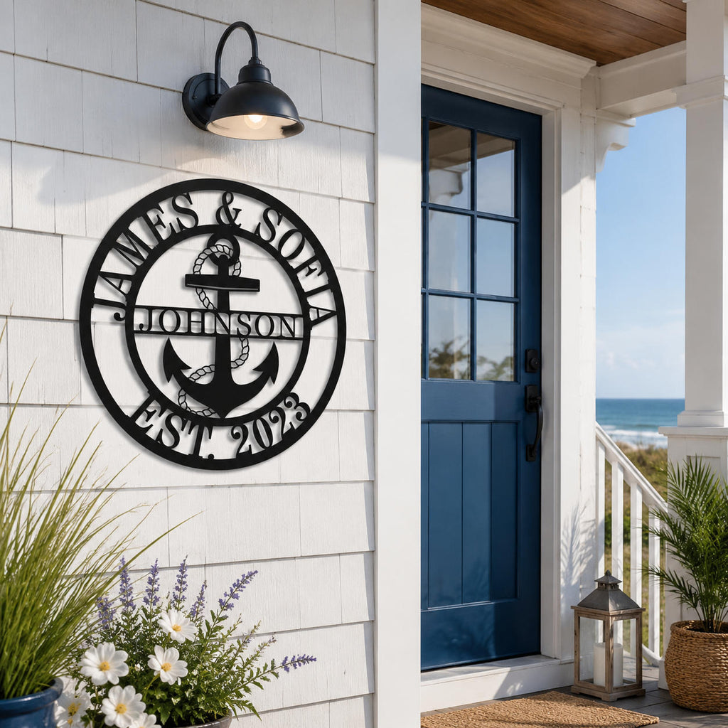 Personalized anchor family name sign installed on a coastal home entryway wall