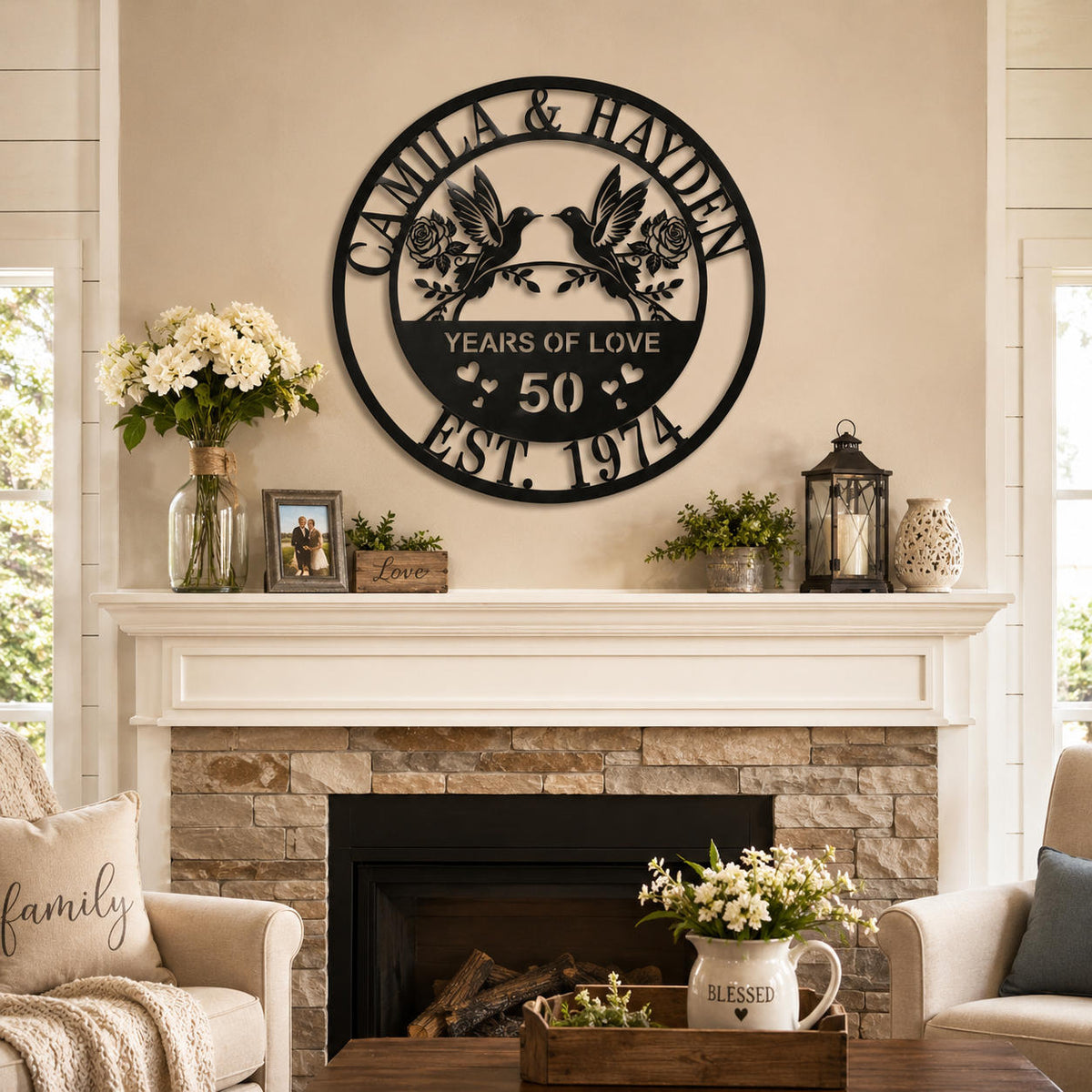 Custom 50th anniversary metal sign with hummingbirds displayed above a fireplace in a cozy farmhouse living room.