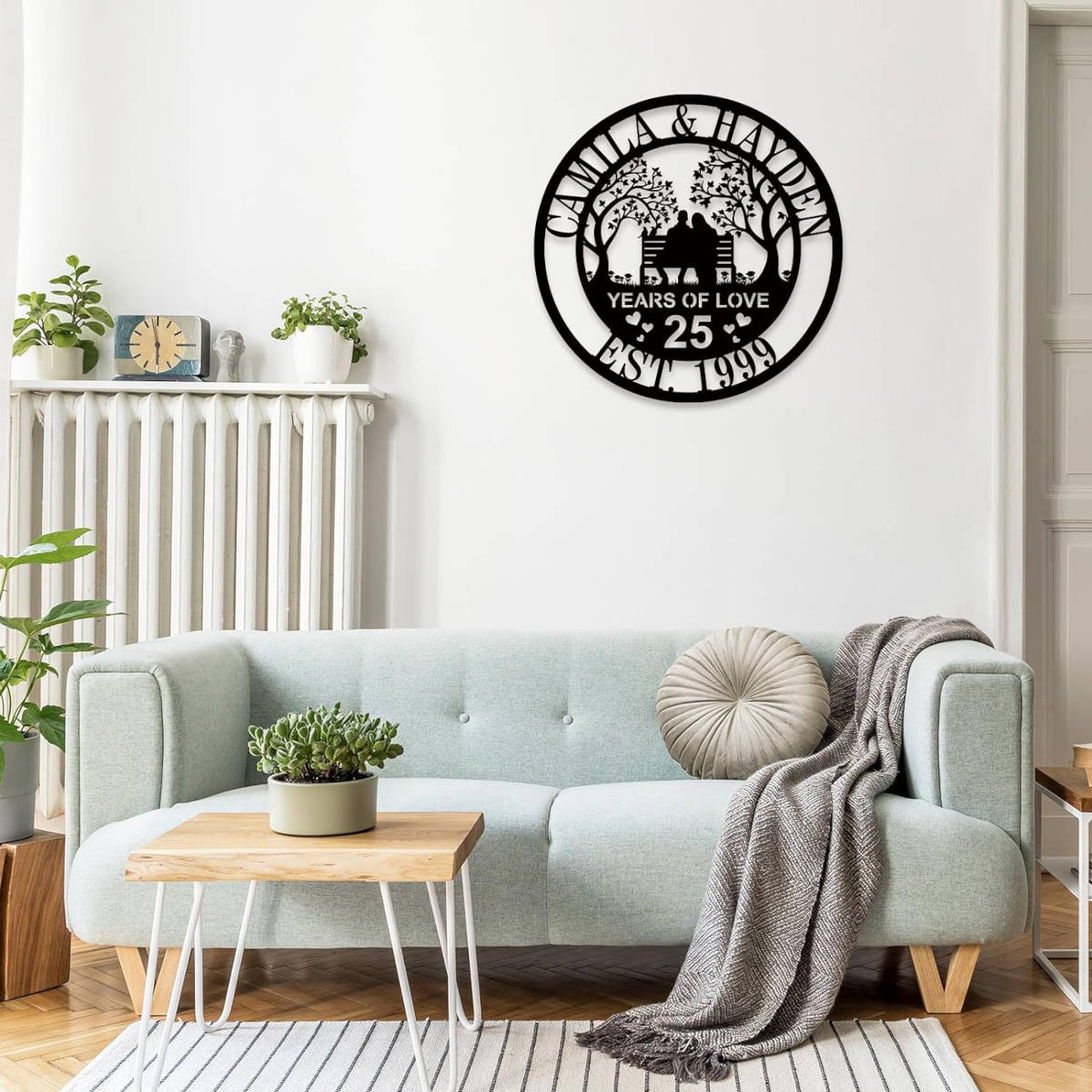 Custom laser-cut steel anniversary sign featuring a couple on a bench with trees, personalized with names, anniversary year, and established date