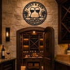 Custom metal wine cellar sign with personalized family name displayed above a luxury wine cellar entrance, perfect for wine lovers and anniversary gifts.