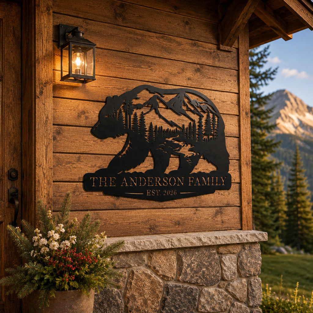 Custom bear family metal sign displayed on the exterior wall of a rustic mountain cabin.