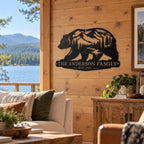 Custom bear mountain family metal sign decorating a cozy lake house living room with natural wood walls and lake views.