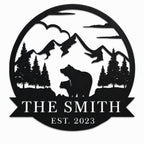 Custom black metal family name sign with mountain bear design isolated on white background