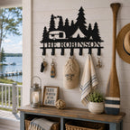 Custom camping key holder displayed in a lake house entryway with keys, a sun hat, and a lightweight towel.