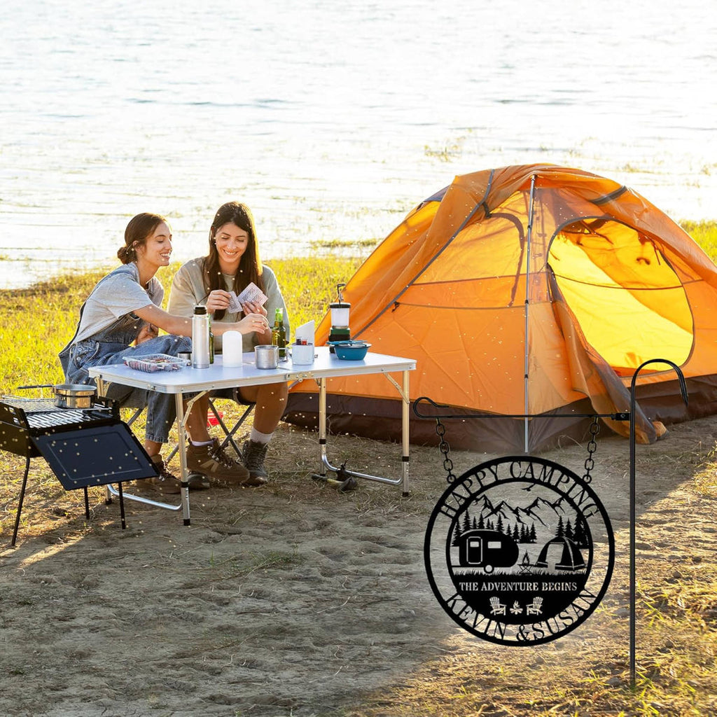 Custom metal camping sign with camper, tent, and mountain design, personalized with names, powder-coated steel for outdoor use.