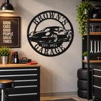 Custom Brown's Garage metal sign displayed in a stylish home automotive workshop with tools and garage decor.