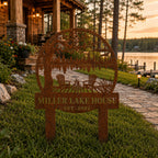 Rusted corten steel personalized lake house sign installed at a lakeside cabin entrance.